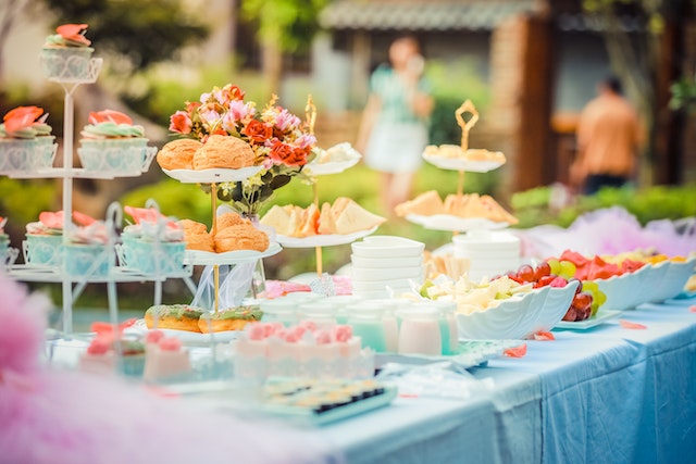 arious-desserts-on-a-table-covered-with-baby-blue-cover